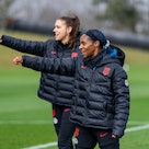 Alex Morgan #13 and Crystal Dunn #19 of the United States warm up during USWNT Training at Bay City ...