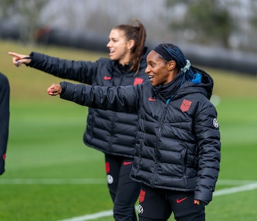 Alex Morgan #13 and Crystal Dunn #19 of the United States warm up during USWNT Training at Bay City ...