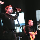 Steven Page (Left) and Ed Robertson (Right) of Barenaked Ladies performing at Neil Young's Bridge Be...