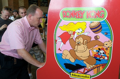 OTTUMWA, IA - AUGUST 13: Steve Sanders, 'The Orignal King of Kong,' plays Donkey Kong at the launch ...
