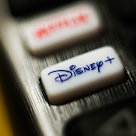 Disney + logo is seen on a TV remote control in this illustration photo taken in Krakow, Poland on A...