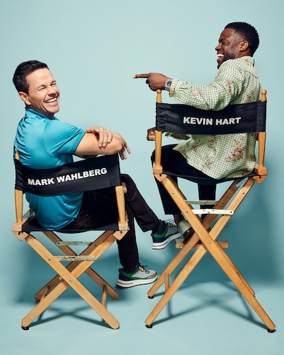Kevin Hart & Mark Wahlberg sitting on their movie chairs