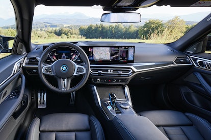 The inside of a A blue BMW i4 eDrive Gran Coupe 